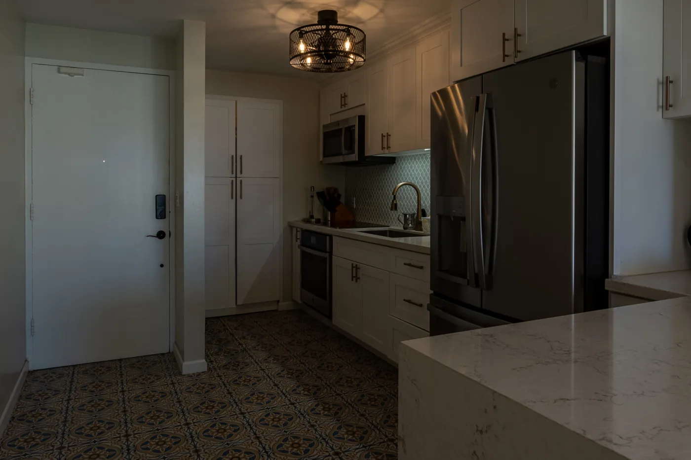 Bright open kitchen with stainless appliances